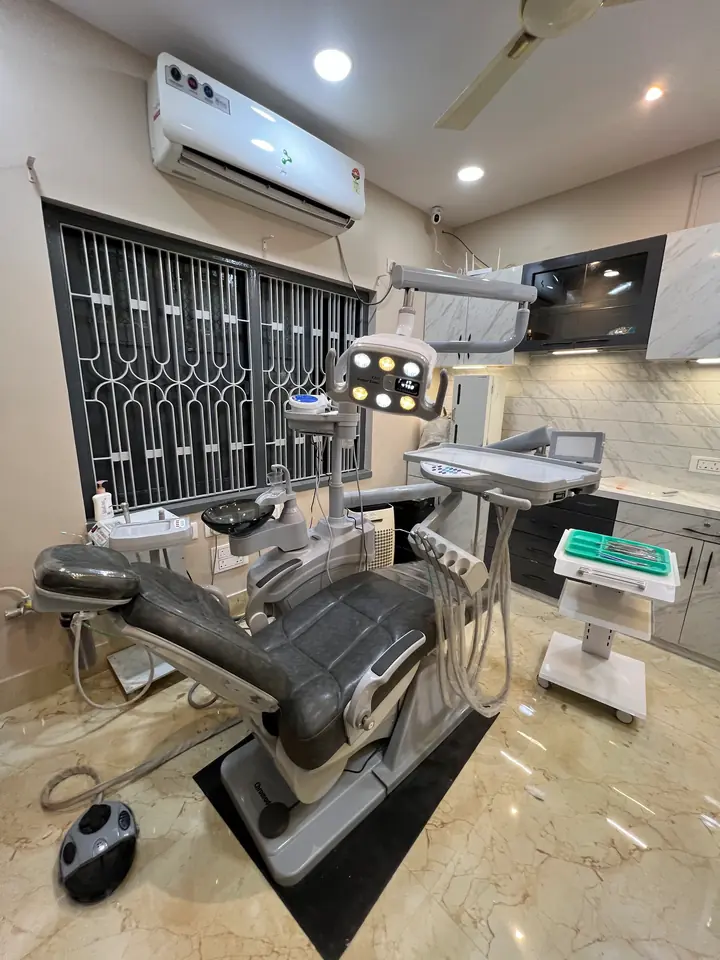 A premium operatory with a grey ergonomic chair at Smile Line