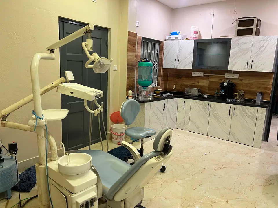 A treatment room with LED ceiling lighting and botanical wall art